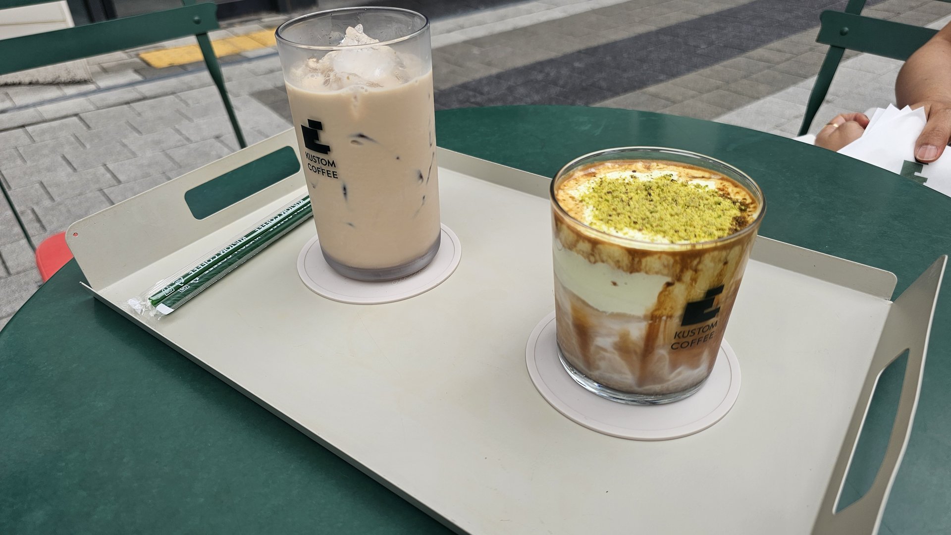 Terrace tray at Kustom Coffee Yeouido with milk tea and pistachio cream latte side by side