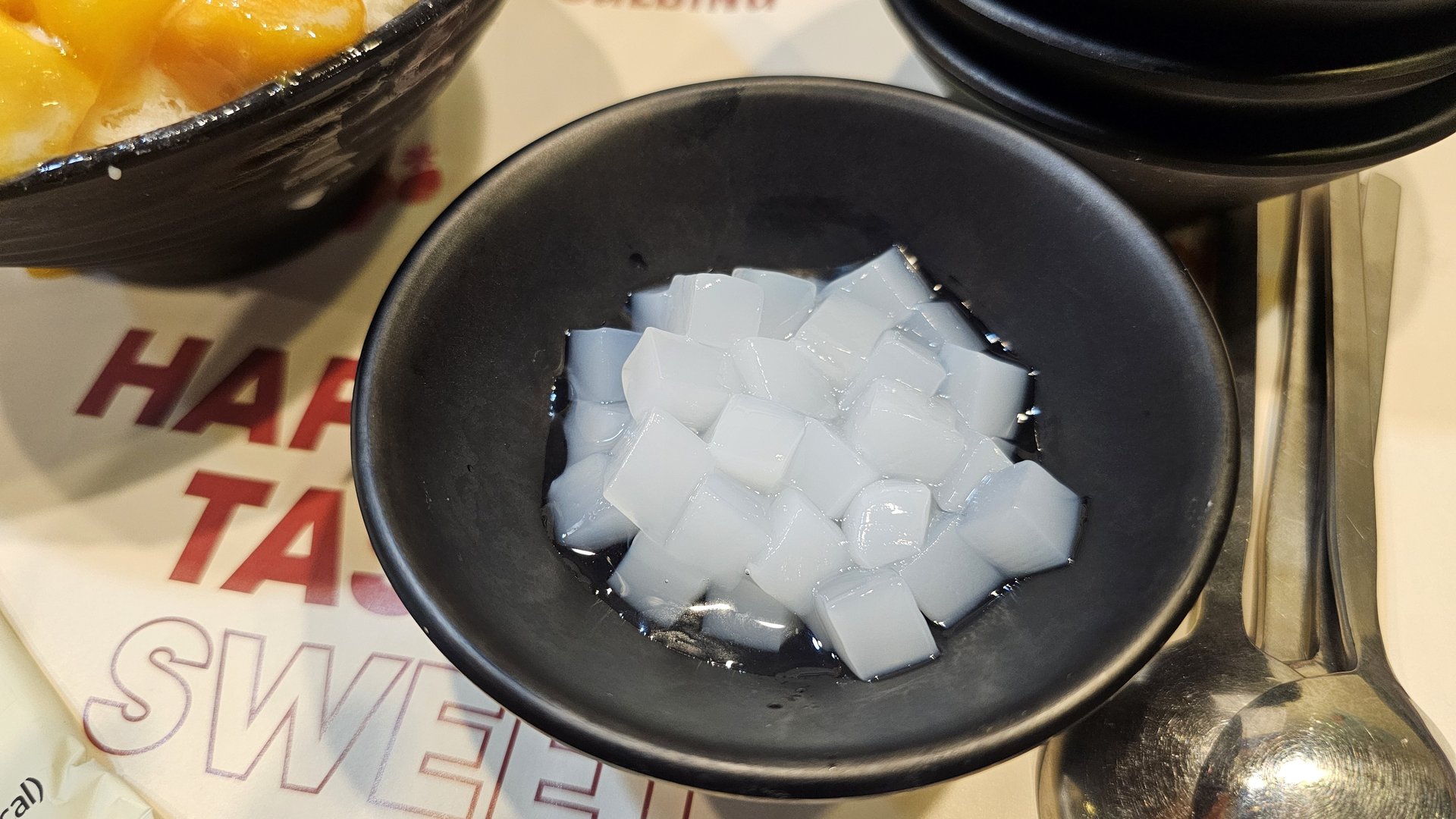 Close-up of agar jelly side topping served with bingsu at Sulbing